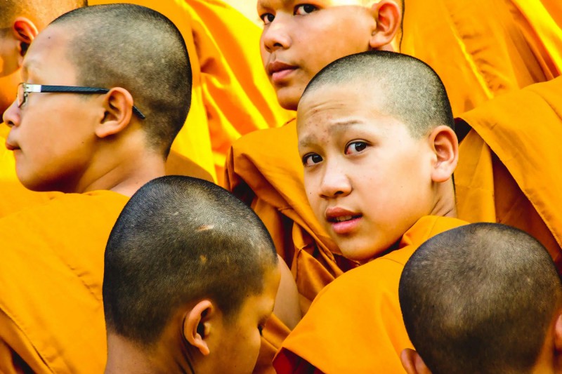 Budhističtí mnisi.