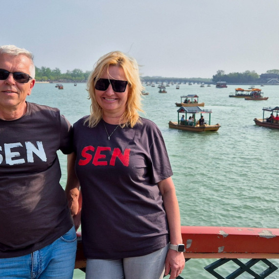 Klienti CK SEN u jezera v Pekingu. 